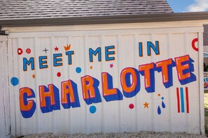 Snap bold pics at this one-of-a-kind mural made for memories and TikToks!