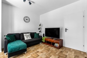 Living Room with Sofa Bed and Smart TV | Book Now with RENTUJEMY.COM