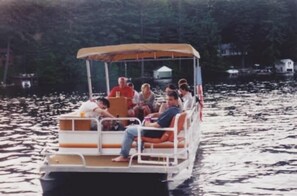 Your Pontoon Boat that is included with your rental.  Use it for leisure or transportation back and forth to mainland parking area.  3 minute ride away