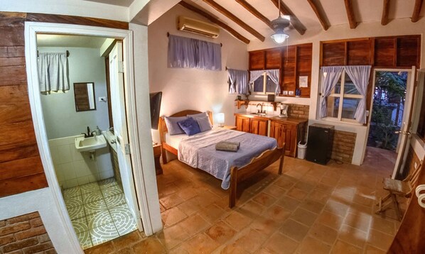 Casita 1 Bedroom with Double bed, AC, Fan, ambiance lighting, with Smart TV, Private Bath and Kitchenette.   Private Fridge for easy access to all your snacks and drinks.  Enjoy our soft designer bedding with fluffy pillows.
