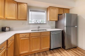 The kitchen provides everything you need to cook and serve up a meal