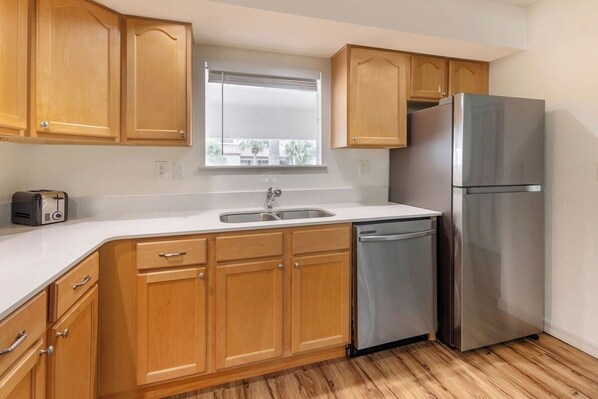 The kitchen provides everything you need to cook and serve up a meal