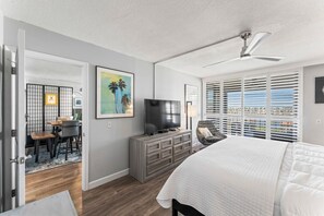 Primary Bedroom - Opens to the living room, view of patio