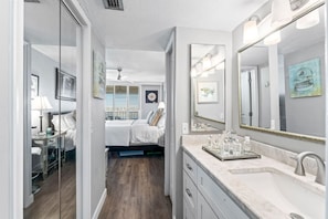Primary Bathroom - single vanity and walk-in closet to the left