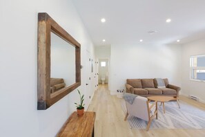 Living room and hallway to bathroom and bedroom