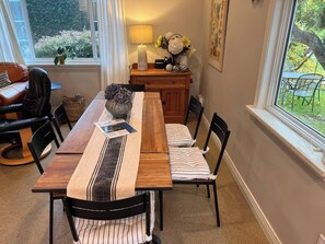 Antique dining table with two leaves, seating up to 6 people. 
