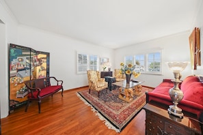 Formal Living Room overlooks the front lawn and seats 5+ comfortably