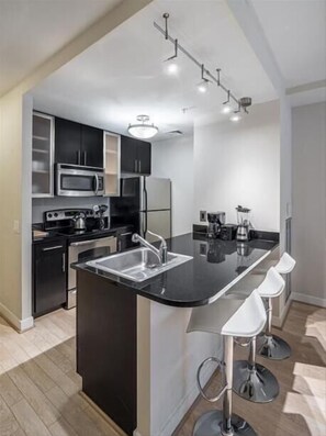 State & Grand Apartments
