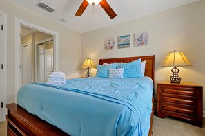 Drift into deep, restful sleep on our cozy queen-size beds with soft linens and plush pillows.