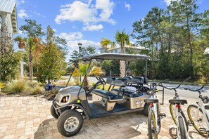 Zip around and explore on the golf cart or provided cruiser bikes!