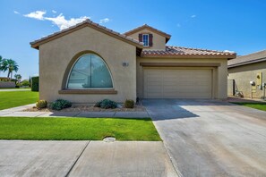 Front of the House. Has two spaces to park in garage and on driveway