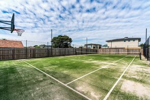 The full size, new tennis court - with basketball ring