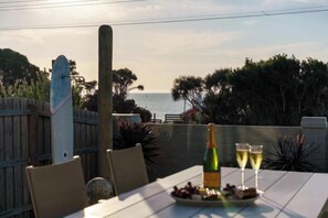 Grab your favourite glass of champagne, sit back and watch as the sun sets over beautiful Safety Beach