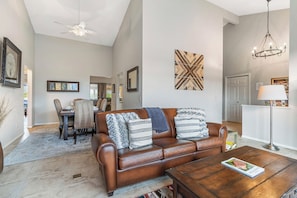 Cozy leather couch, smart TV, and plenty of natural light and great view!