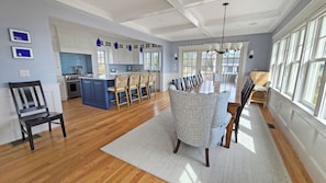 Dining area with kitchen beyond