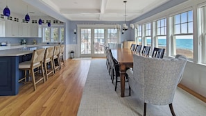 Dining area with kitchen beyond