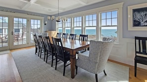 Dining area with large table and amazing water views