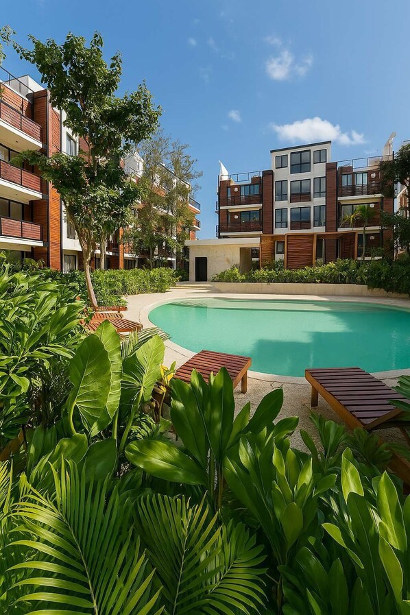 Outdoor Pool (Ground Floor)
💦 Take a dip in the serene ground-floor pool, surrounded by tropical landscaping.