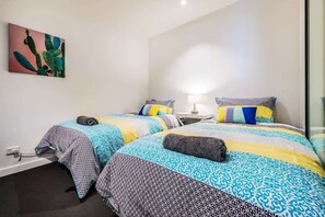 2nd bedroom with 2 king single bed comfortable and spacious for adults too
