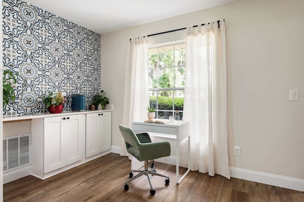 Enjoy a dedicated workspace to focus on your tasks. Experience the versatility of this space.