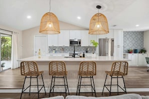 Experience the joy of cooking in a stylish and well-equipped space. Our kitchen is designed for both functionality and beauty.