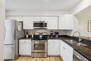 Prepare your favorite meals in the full kitchen 