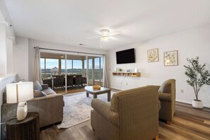 Curl up in the breezy living room & stream your favorites on the smart TV