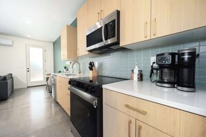 As you step into CarlanLanding, you'll be greeted by modern amenities, tasteful décor, art showcasing the Knoxville area, and a spacious layout filled with charm. Welcome home.