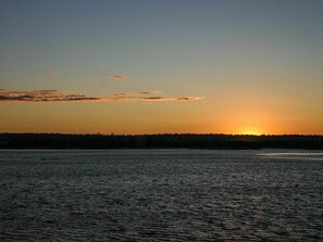 A westerly view across the water offers sunsets on a clear evening