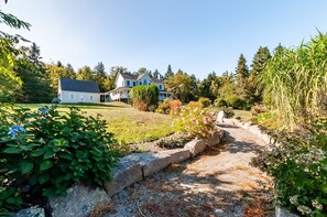 Beautiful landscaping and path to firepit