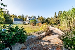 Beautiful landscaping and path to firepit