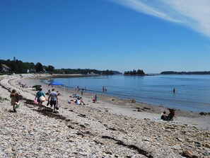 Looking down the beach on a hot August day from the cottage