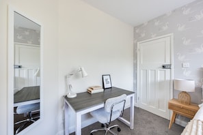 Work desk - perfect for those working or studying from home. There is free and fast Wifi throughout the bungalow.
