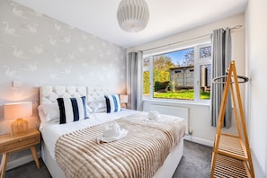 Bedroom 1 - Zip and link bed set up as twin beds by default or can be zipped together as a king size bed upon request.