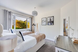 Bedroom 1 - Zip and link bed set up as twin beds by default or can be zipped together as a king size bed upon request.