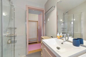 This bathroom offers a comfortable and functional space for guests.