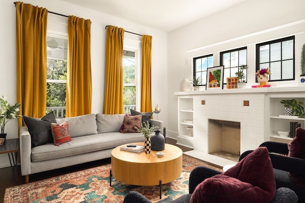 Relax in style on our cozy couch with plush throw pillows – the perfect spot to unwind after a long day.
