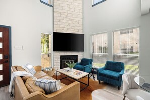 Lounge on the comfortable couch or chairs and watch some TV, read a book, or enjoy the fireplace