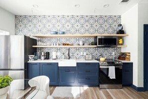 Modern, fully-stocked kitchen ready for you create some culinary masterpieces.