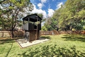 Kids will love the swings, sandbox, and trampoline in the backyard. A fun and safe space for little adventurers to explore.