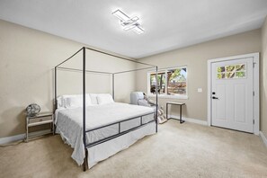 Unwind in the spacious master bedroom with a king bed and en-suite bathroom. Your private retreat for ultimate relaxation.om with king bed. 