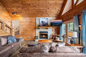 Living room, open space w/vaulted VIEW windows, 2 sofas, TV, charging station, sleeper sofa, etc.