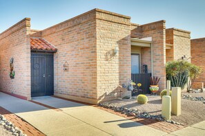 Townhome Exterior | Parking | Reserved Carport (1 Vehicle)