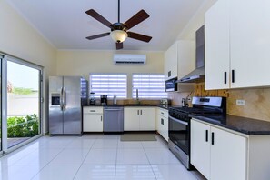Cook, entertain, and connect in this spacious open-concept kitchen