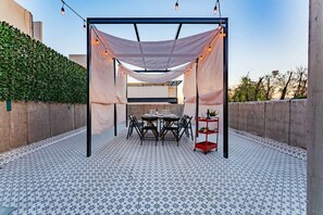 The table is shaded for your comfort