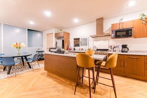 You can have a seat in the kitchen while doing meal prep