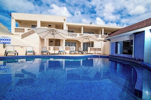 Take a refreshing dip in our shared pool.