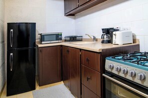 Fully equipped kitchenette awaits! Start your day with coffee & toast.