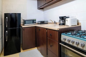 Fully equipped kitchenette awaits! Start your day with coffee & toast.