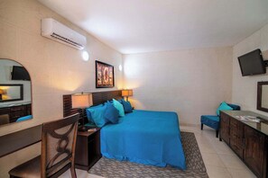 Relax in your cozy king-size bed.